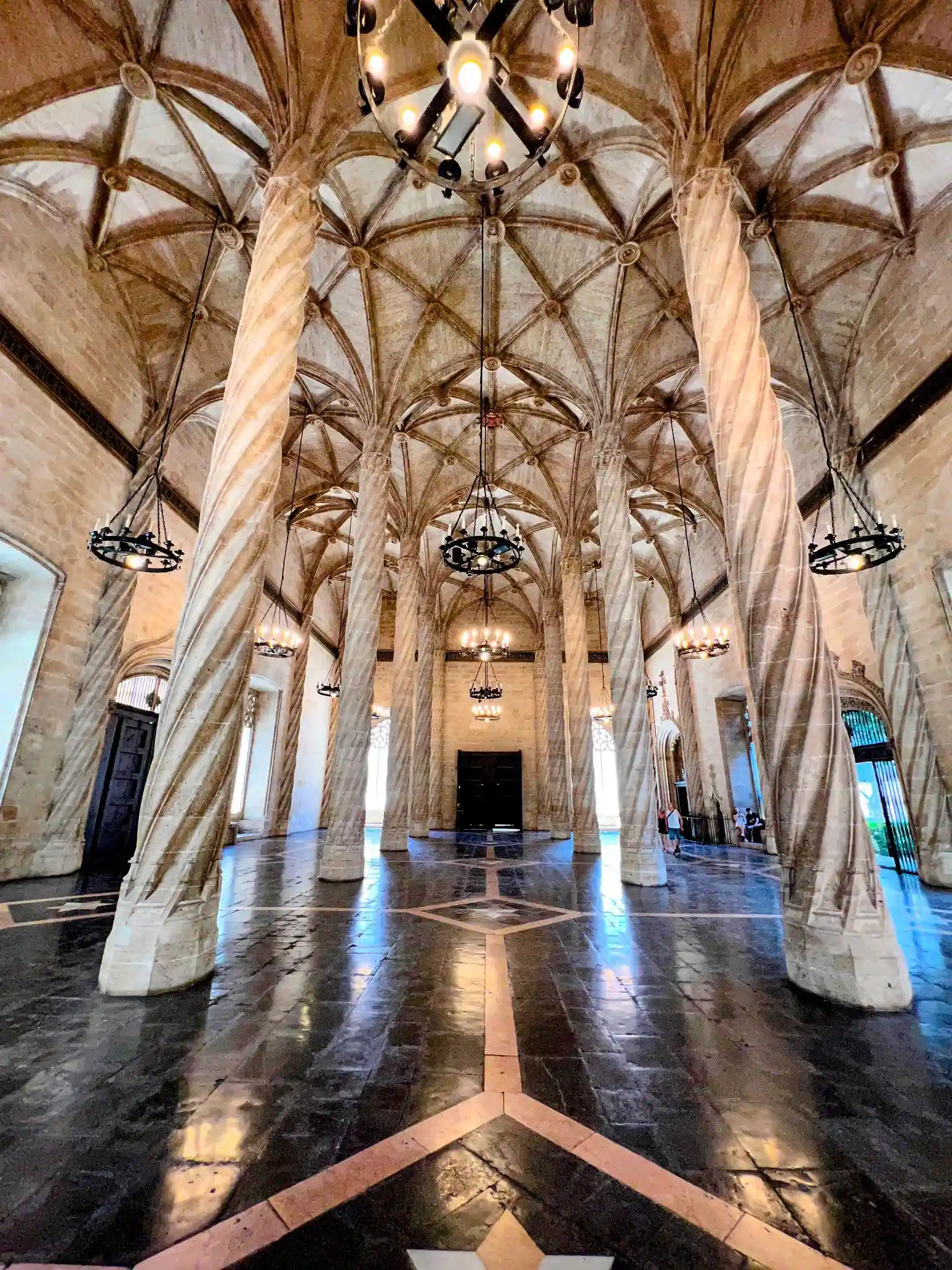 Twisted Gothic columns inside the Columned Hall of La Lonja de la Seda in Valencia